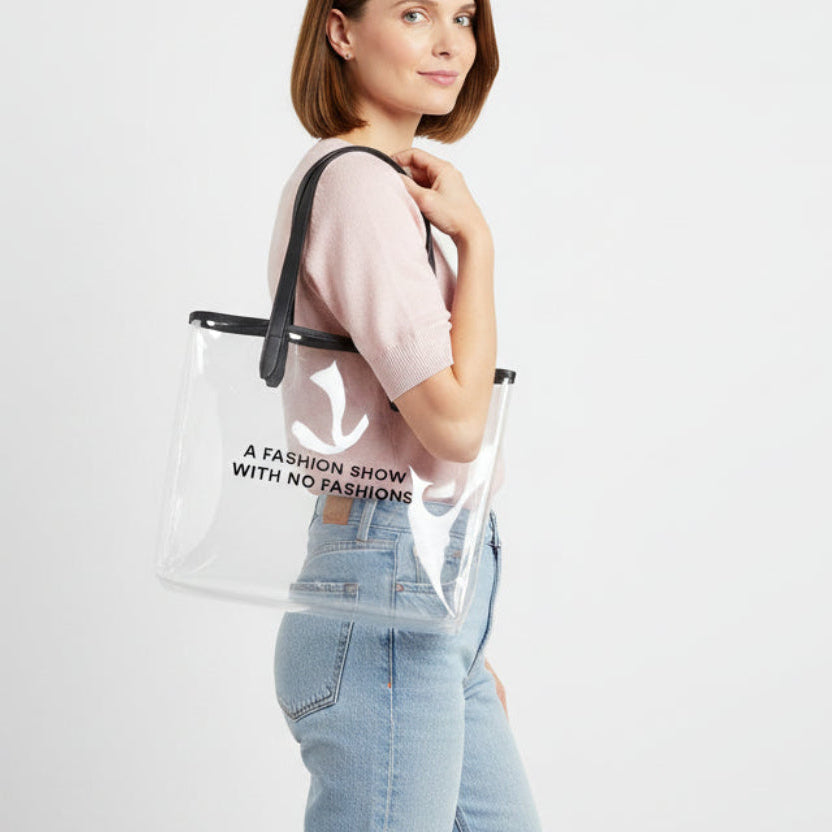 A FASHION SHOW WITH NO FASHIONS clear tote bag